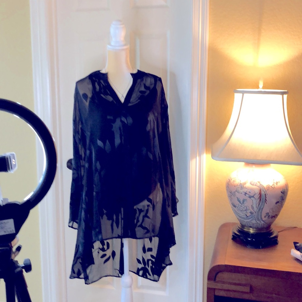 Correction: the top layer is 63% silk and 37% Viscose.
